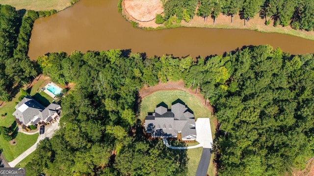 drone / aerial view with a water view