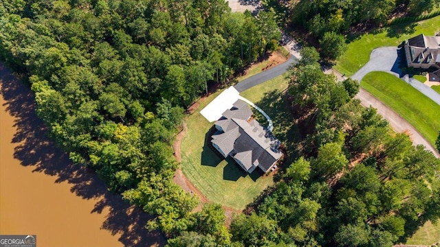 bird's eye view with a water view