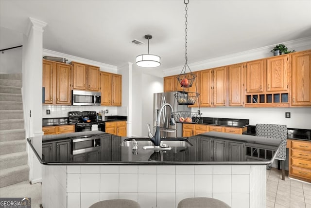 kitchen with sink, stainless steel appliances, backsplash, pendant lighting, and ornamental molding