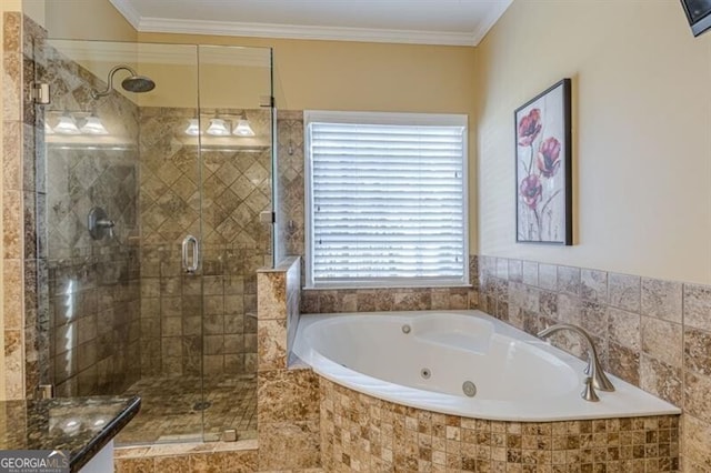 bathroom featuring a whirlpool tub, a shower stall, and crown molding