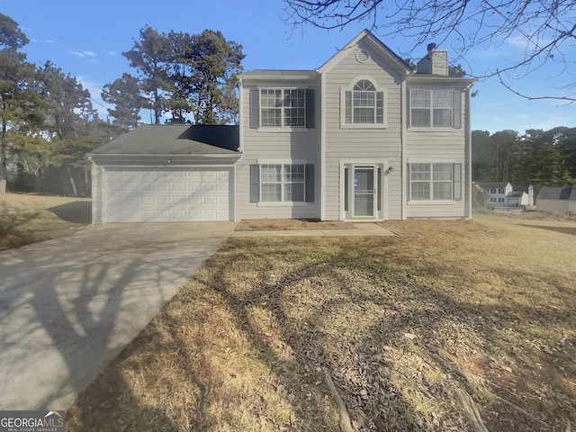 colonial house featuring a garage