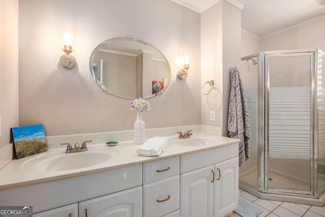 bathroom with vanity, tile patterned floors, walk in shower, and crown molding