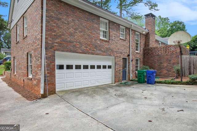 view of property exterior featuring a garage