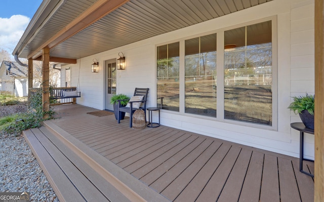 wooden deck featuring a porch