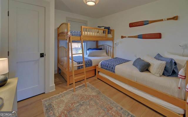 bedroom with light hardwood / wood-style floors