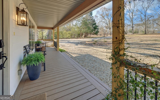 wooden deck featuring a porch