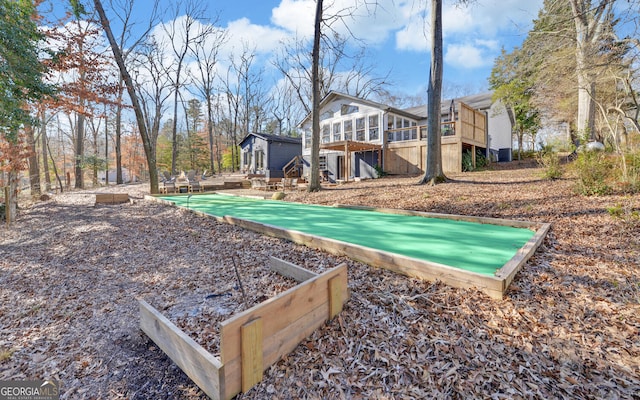 view of yard with a deck