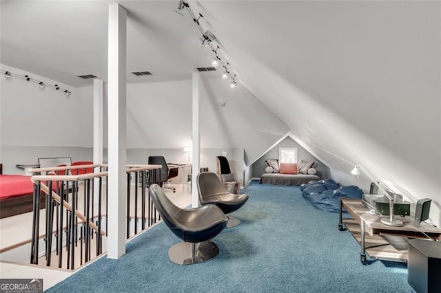 living area with carpet floors and lofted ceiling