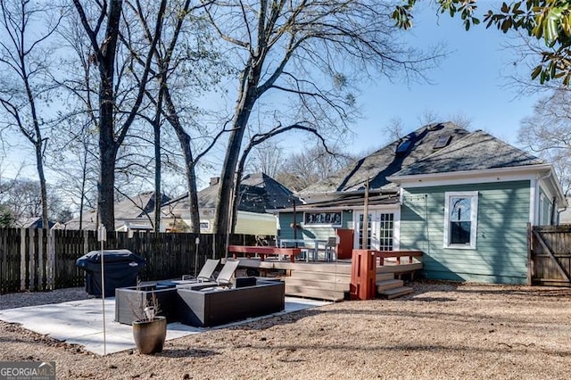 exterior space featuring a patio area and a deck