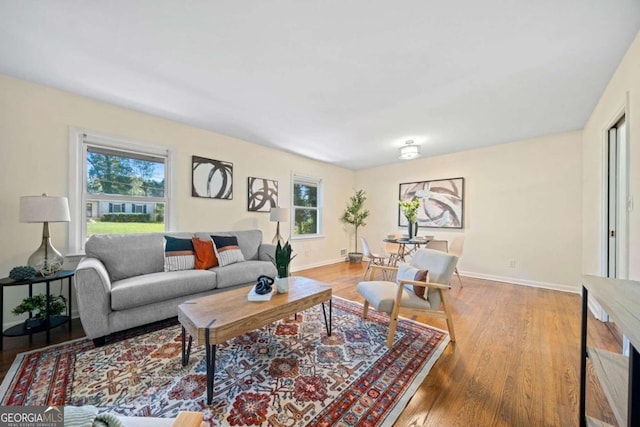 living room with light hardwood / wood-style floors