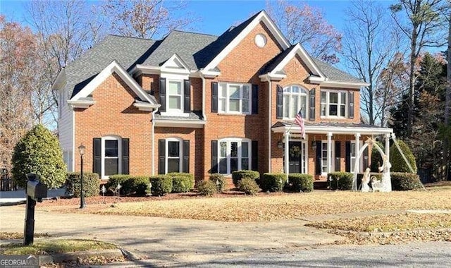 view of front of property featuring covered porch