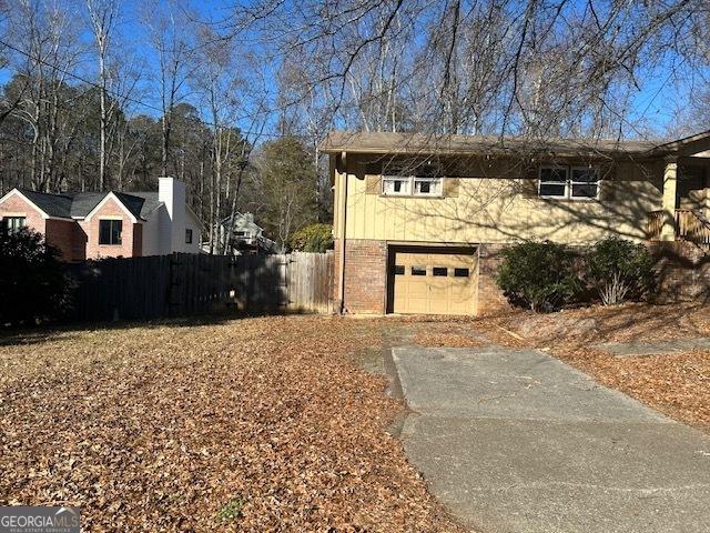 view of home's exterior with a garage