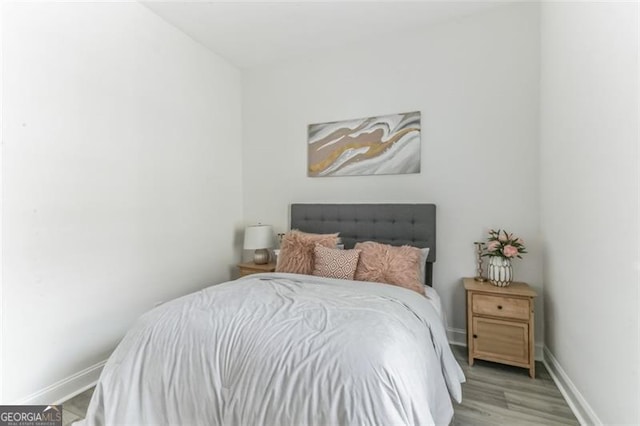 bedroom featuring light wood-type flooring