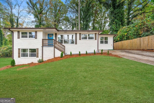 view of front of house with a front lawn