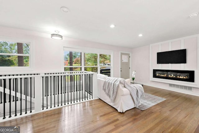 living room featuring hardwood / wood-style floors and plenty of natural light