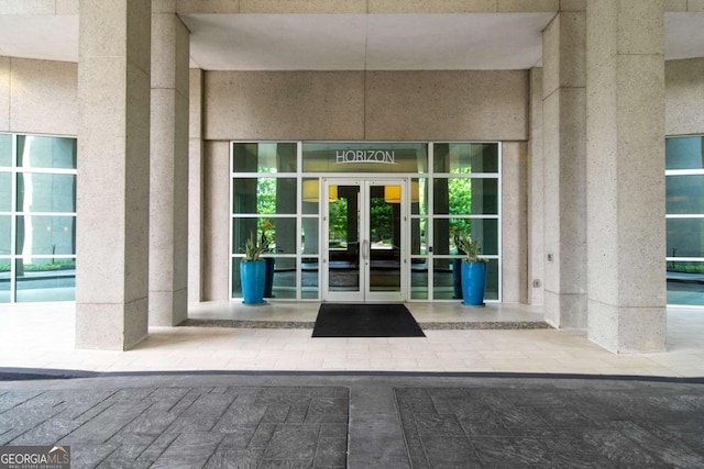 entrance to property featuring french doors