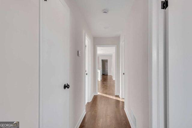 hall featuring dark hardwood / wood-style floors