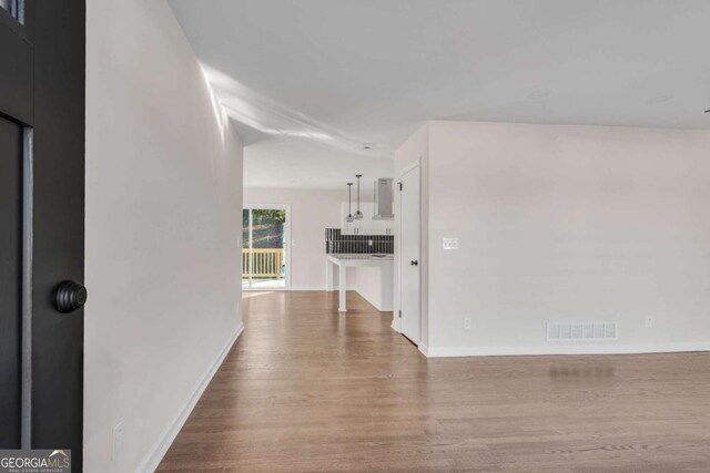 interior space with hardwood / wood-style floors