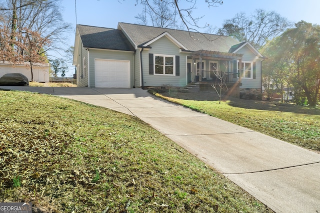 ranch-style house featuring a pergola, a garage, and a front lawn