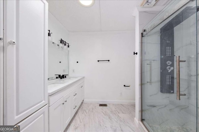 bathroom with vanity and an enclosed shower