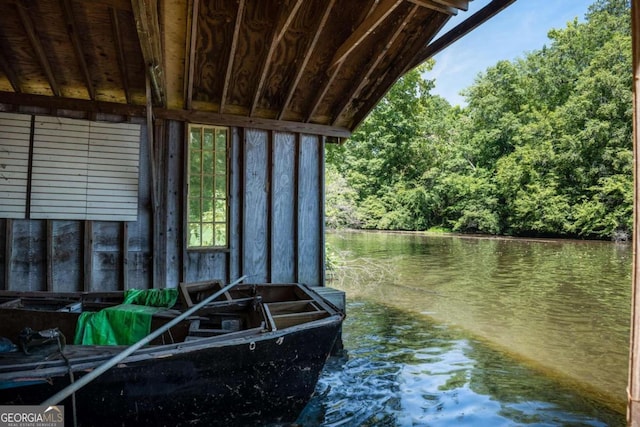 view of dock with a water view