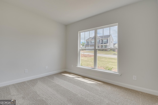 view of carpeted spare room