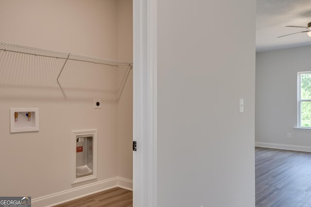 laundry room featuring hookup for an electric dryer, ceiling fan, hardwood / wood-style floors, and washer hookup