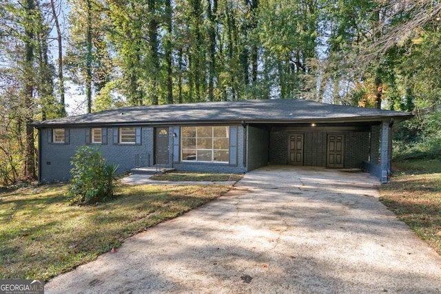 ranch-style home with a front lawn and a carport