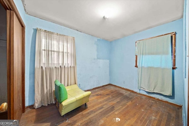 unfurnished room featuring dark hardwood / wood-style floors