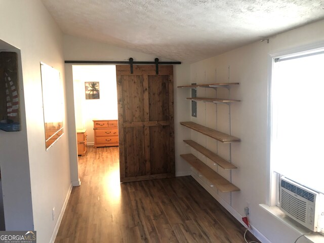 bathroom featuring vanity, plenty of natural light,  shower combination, and wood-type flooring