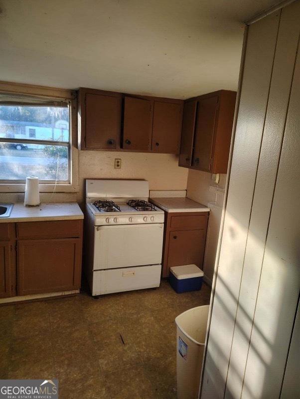 kitchen featuring white gas range