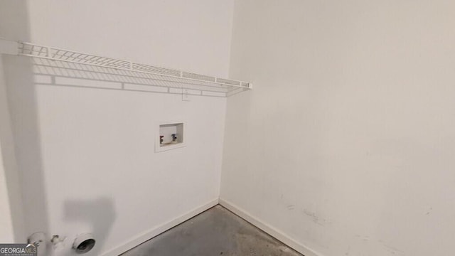 clothes washing area with hookup for a washing machine