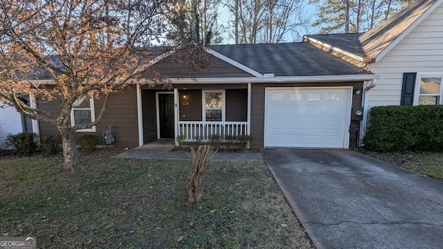 single story home featuring a porch and a garage