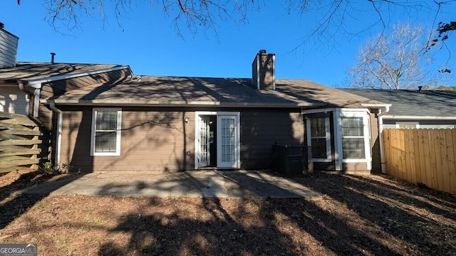 rear view of house featuring a patio