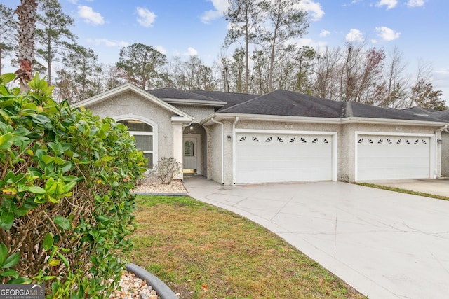 ranch-style home featuring a garage