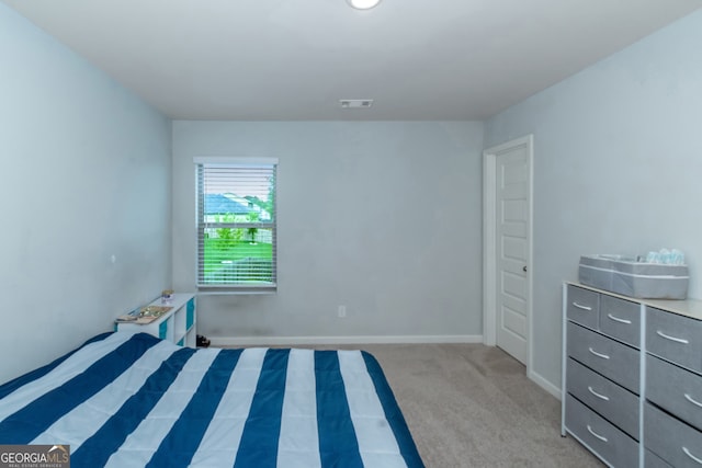 unfurnished bedroom with light carpet