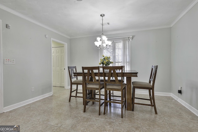 tiled dining room featuring ornamental molding and an inviting chandelier