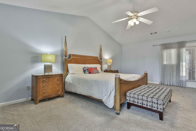 bedroom featuring carpet floors, vaulted ceiling, and ceiling fan