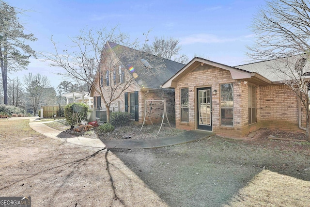 view of front of property with cooling unit