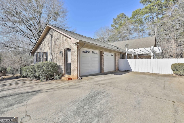 view of side of property featuring a garage