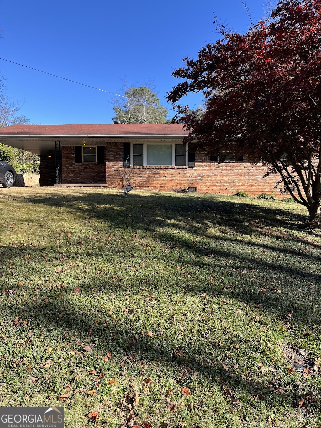 1310 Celia Way, Decatur, GA 30032 - view of front of house with a carport and a front lawn