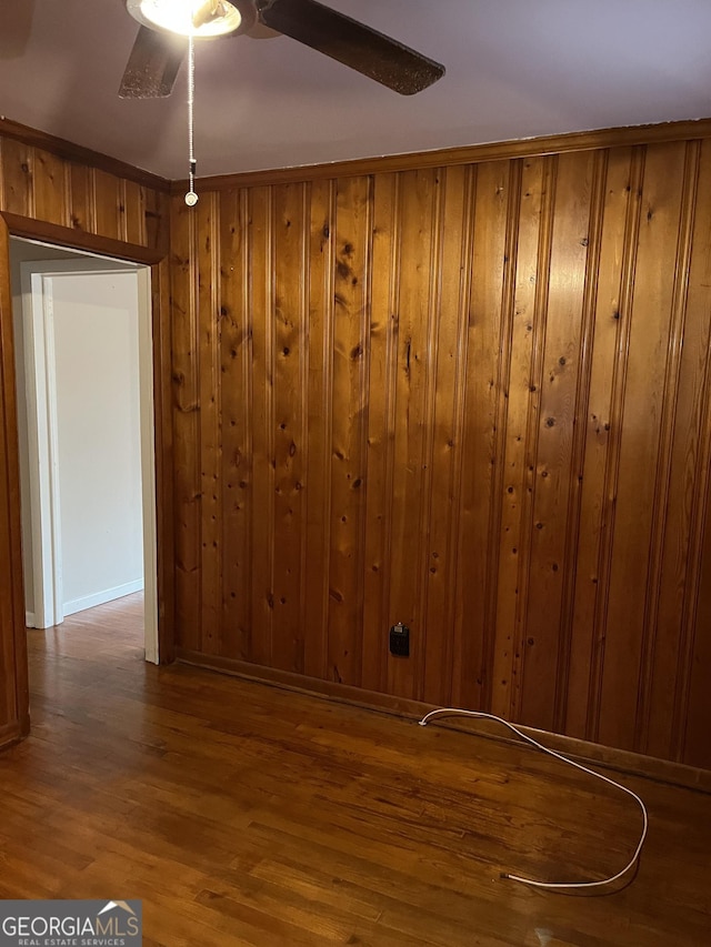 empty room featuring wood-type flooring