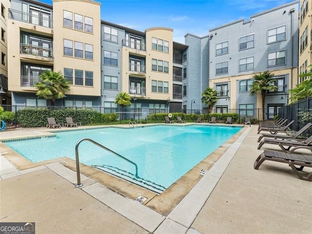 view of pool featuring a patio