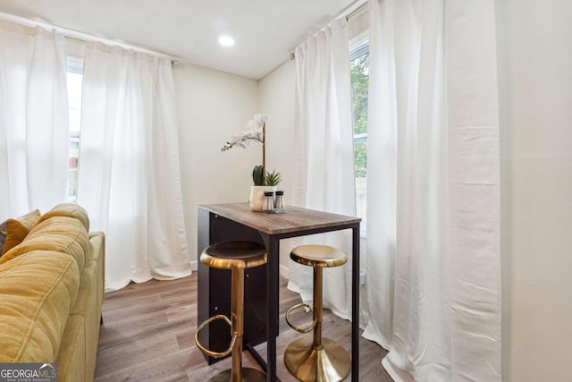 dining area with hardwood / wood-style floors