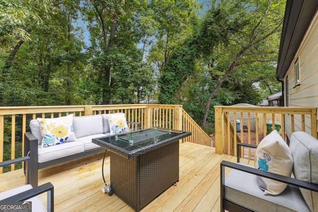 wooden deck featuring an outdoor hangout area