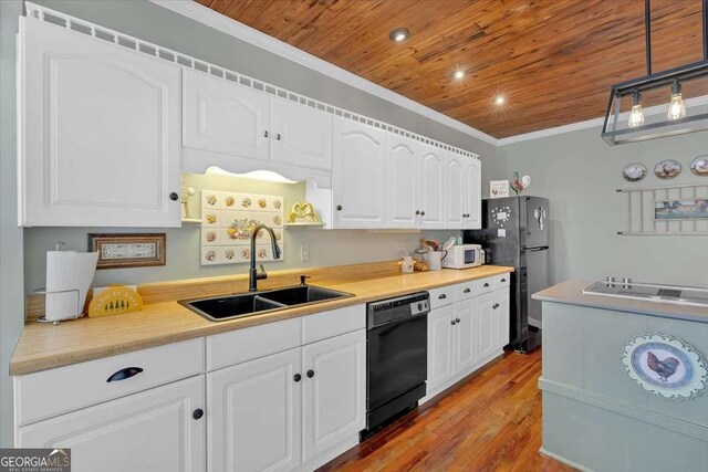 kitchen with black appliances, a sink, wood ceiling, and crown molding