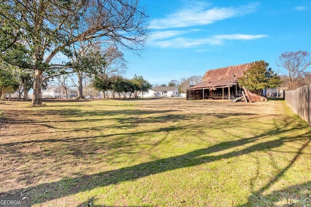 view of yard with fence