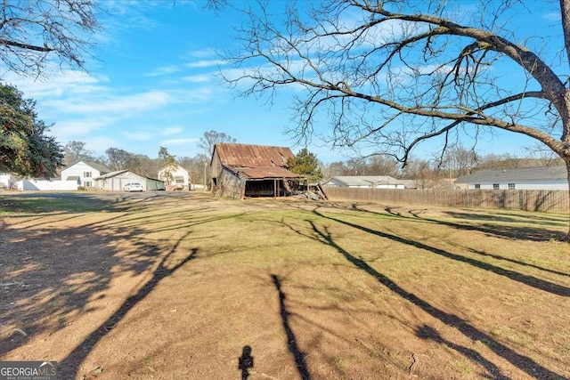 view of yard featuring fence