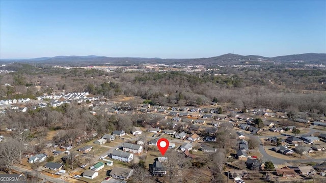 drone / aerial view with a residential view and a mountain view