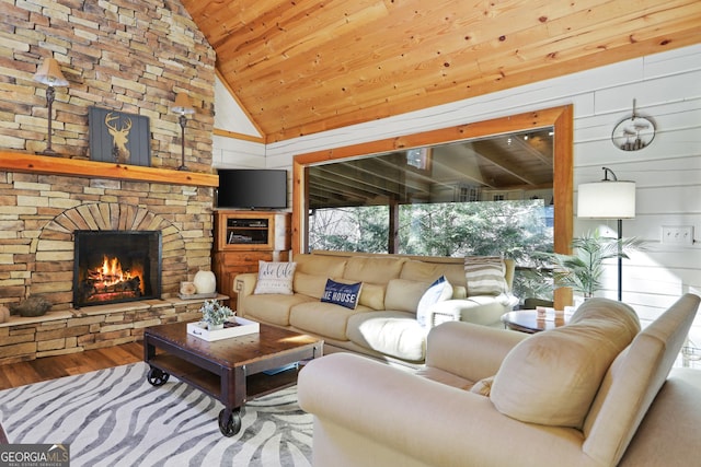 living room featuring a fireplace, wood-type flooring, wooden walls, and wood ceiling